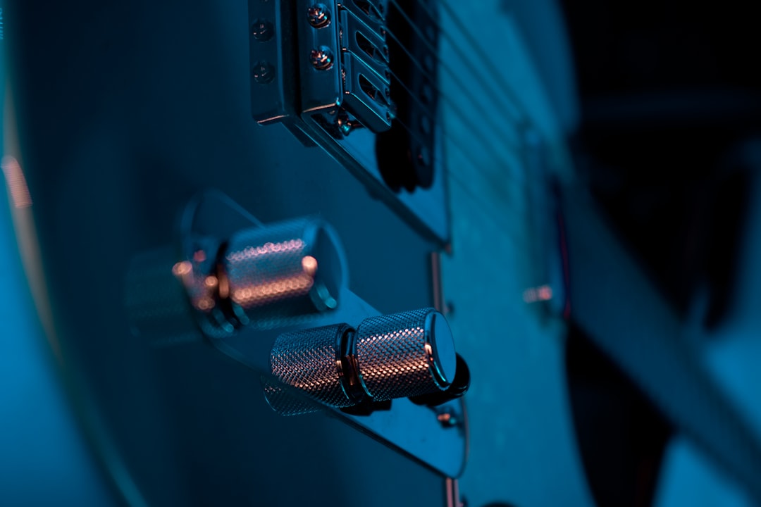 red and black electric guitar